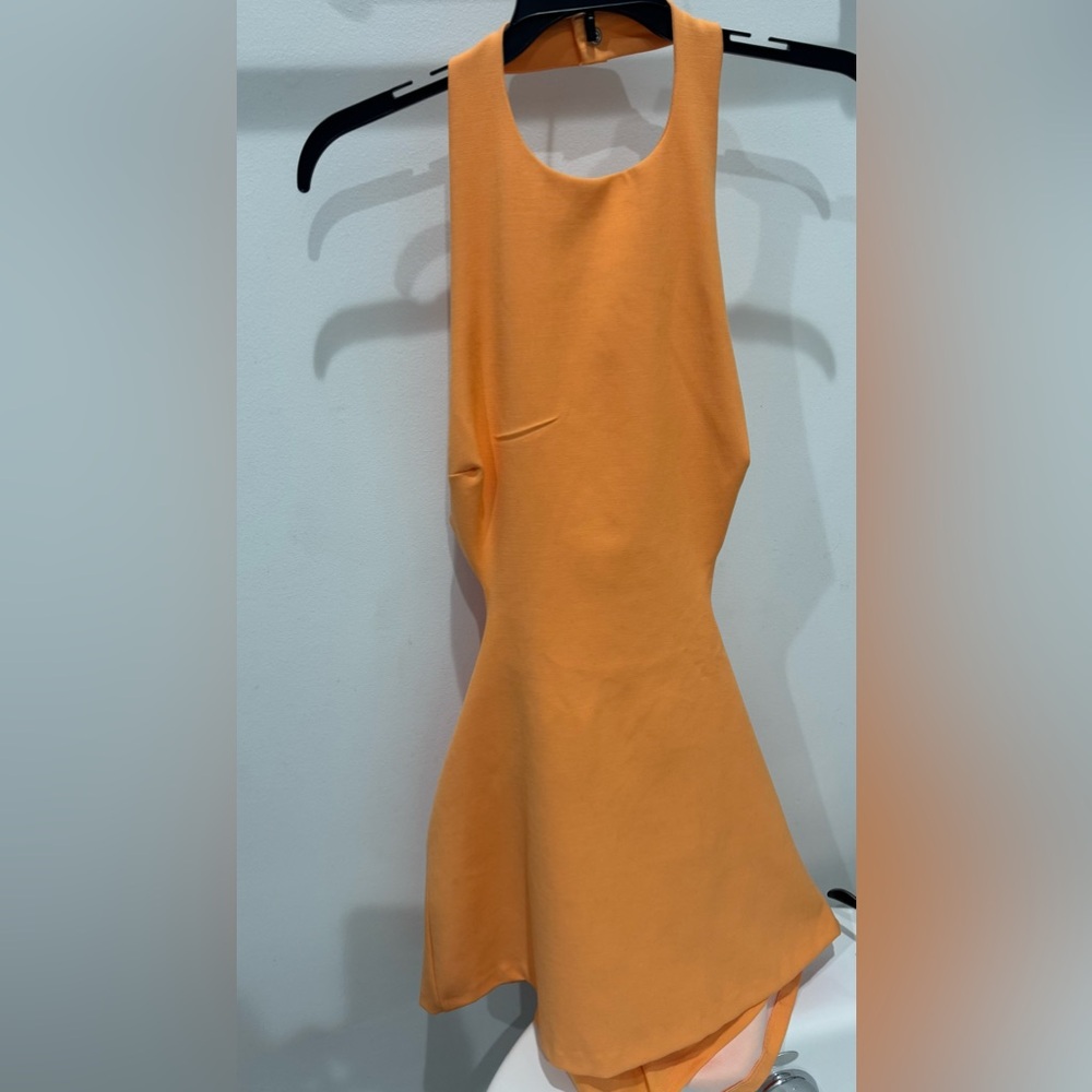 Backless melon colored dress